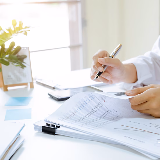 Documents are checked and processed as part of administrative tasks.