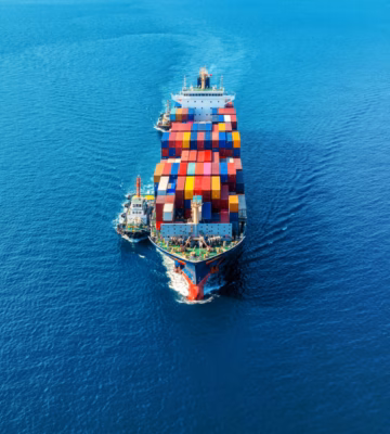A container ship transports cargo containers by sea for international freight transport.