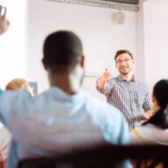 Participants actively engage in a training session by asking questions and sharing knowledge.
