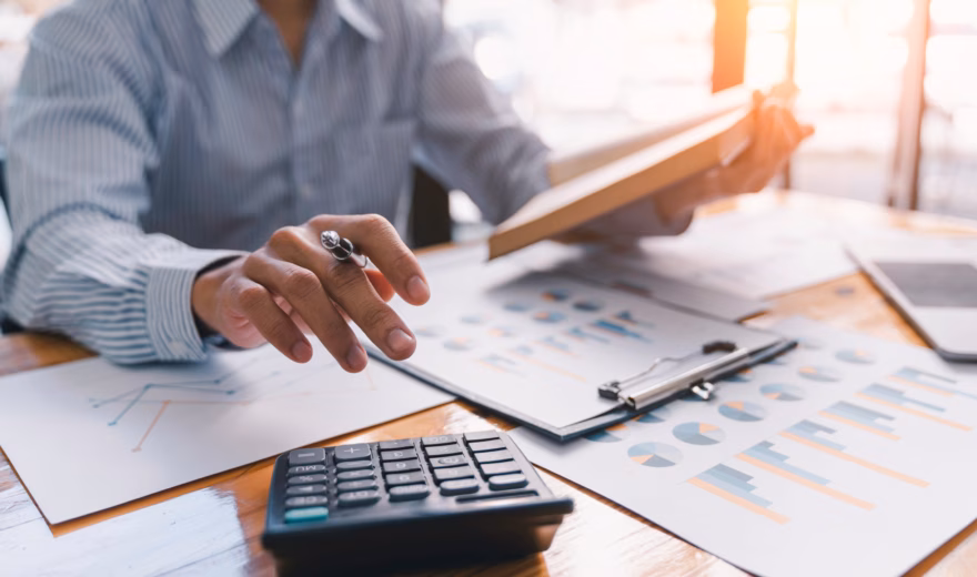 Financial reports and data are reviewed for analysis and decision-making.