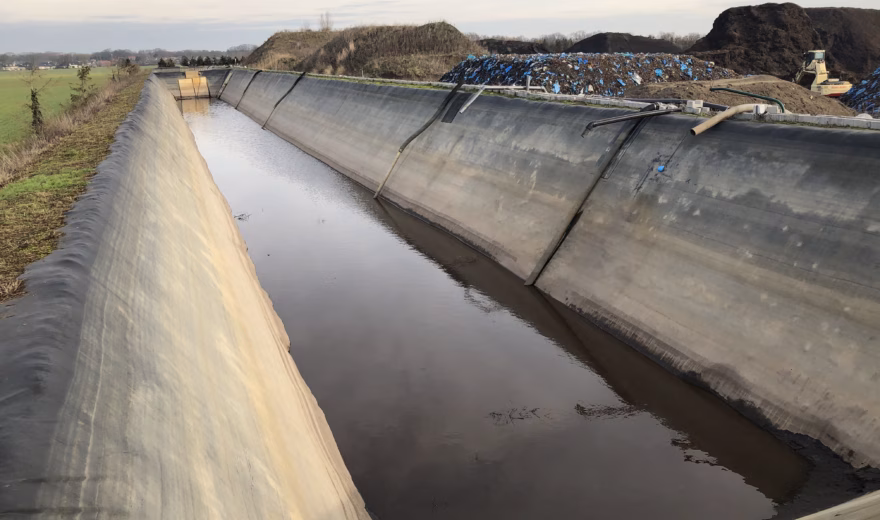 A water basin with a waterproofing system for the collection and containment of liquids at an industrial site.