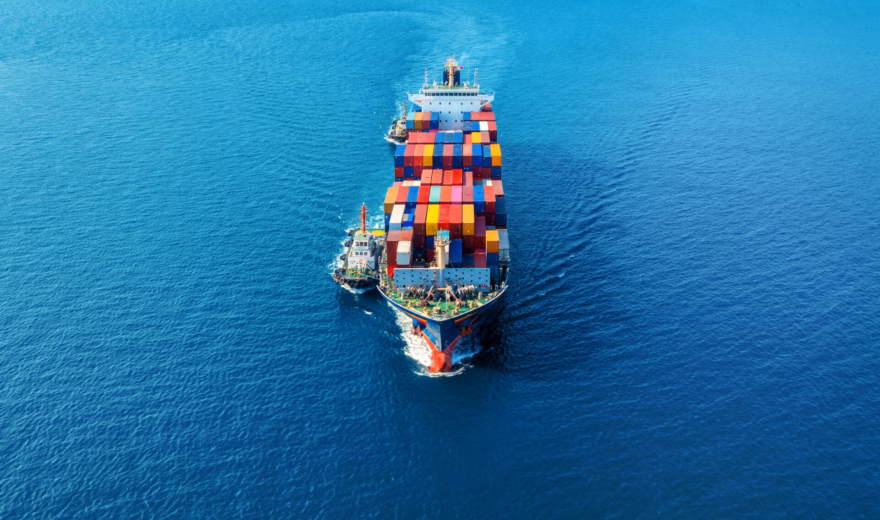 A container ship transports cargo containers by sea for international freight transport.