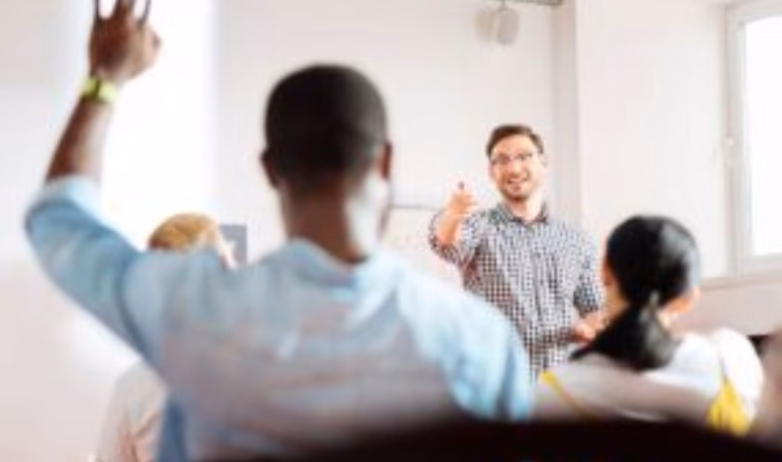 Participants actively engage in a training session by asking questions and sharing knowledge.