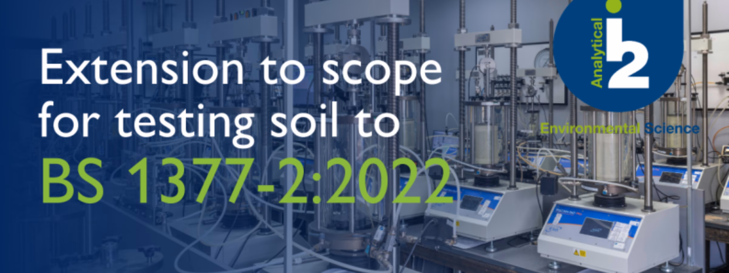 Banner regarding the expansion of the test scope for soil testing in accordance with BS 1377-2:2022 in a laboratory setting.