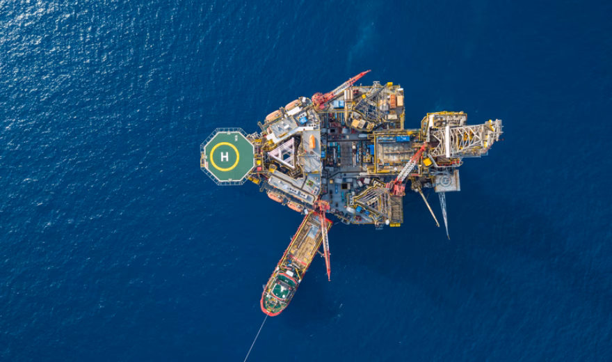 Aerial view of an offshore installation in the open sea used for industrial activities.