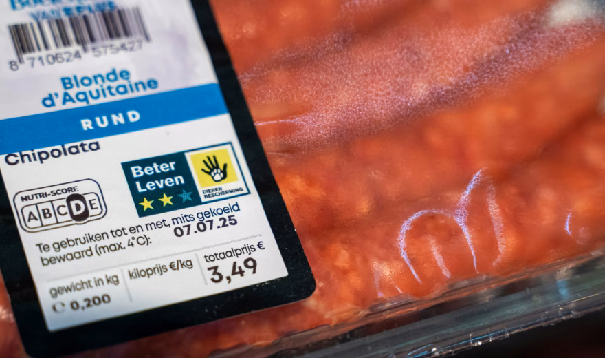 Close-up photo of packaged beef chipolata with product information and nutrition label.
