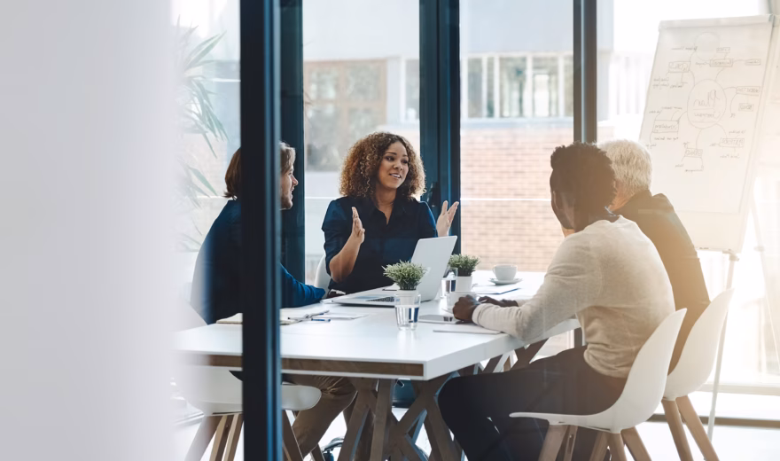 Planning, teamwork and meeting with business people in boardroom for strategy, brainstorming and solution. Corporate, collaboration and conference with employees in office for negotiation development.