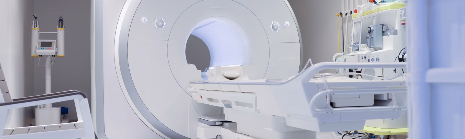 Nuclear magnetic resonance imaging laboratory with high technology contemporary equipment. White sterile MRI room concept