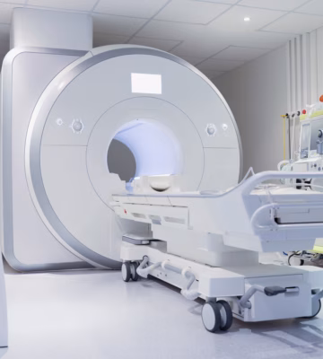 Nuclear magnetic resonance imaging laboratory with high technology contemporary equipment. White sterile MRI room concept