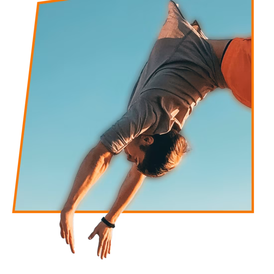 A man is performing flips in the air.