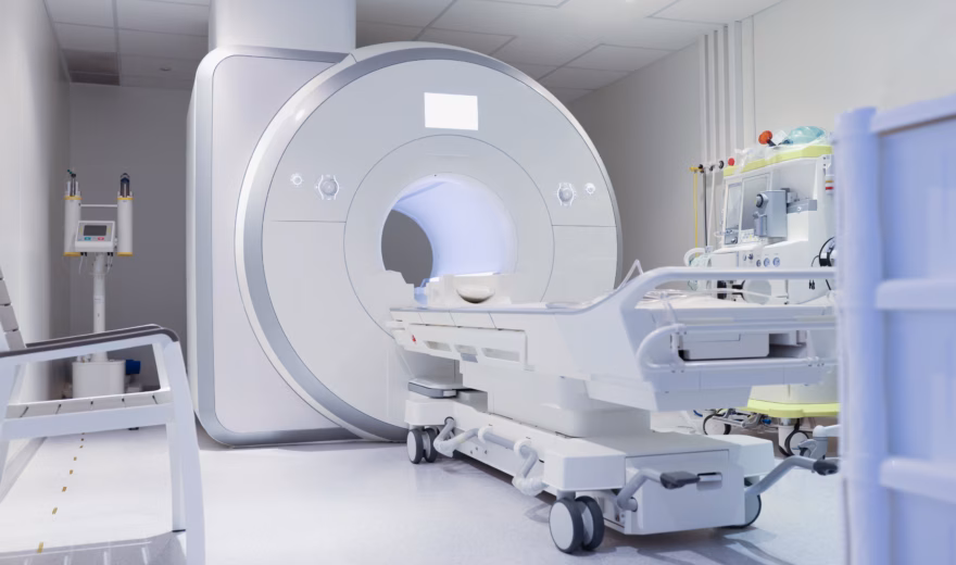 Nuclear magnetic resonance imaging laboratory with high technology contemporary equipment. White sterile MRI room concept
